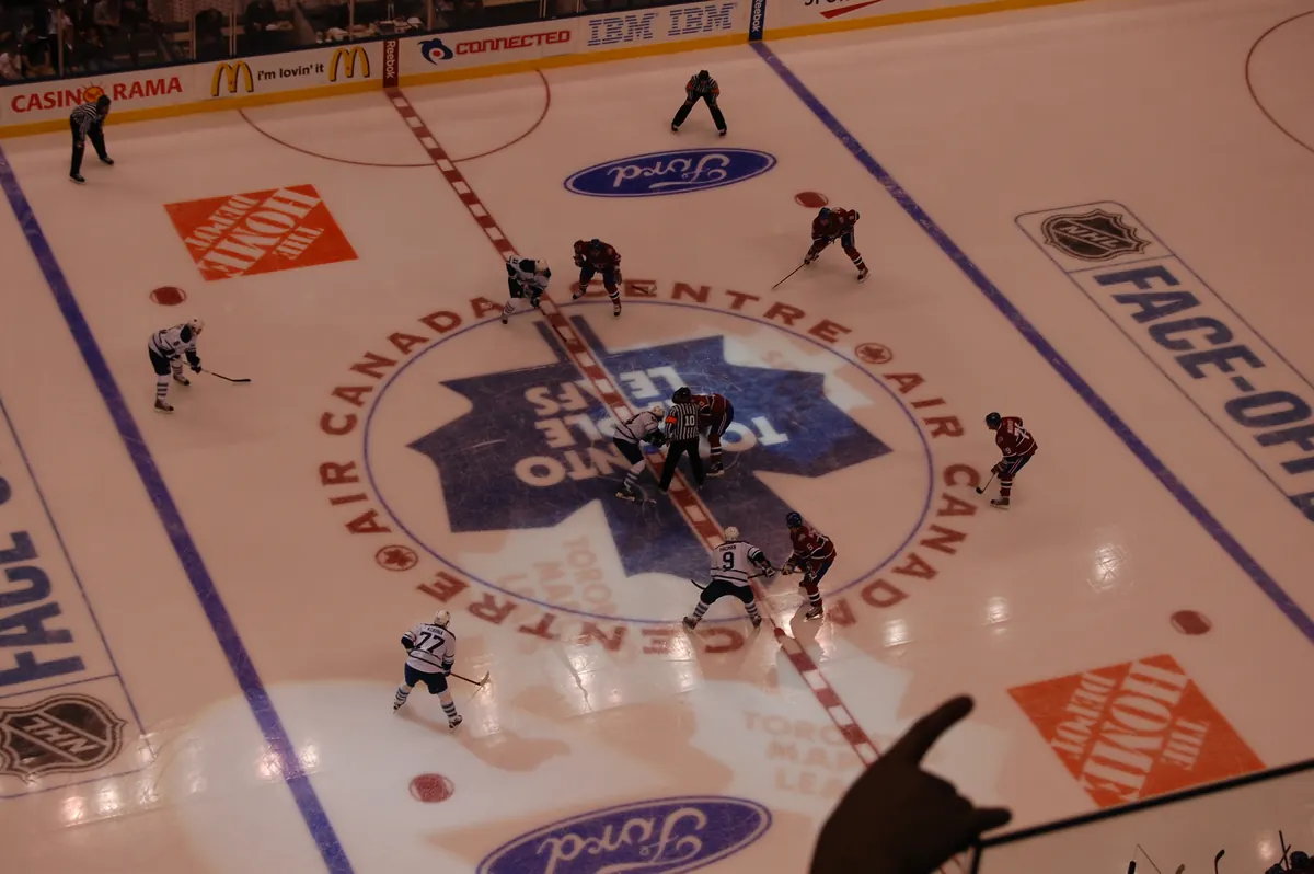 Hockey match today — NHL faceoff at center ice