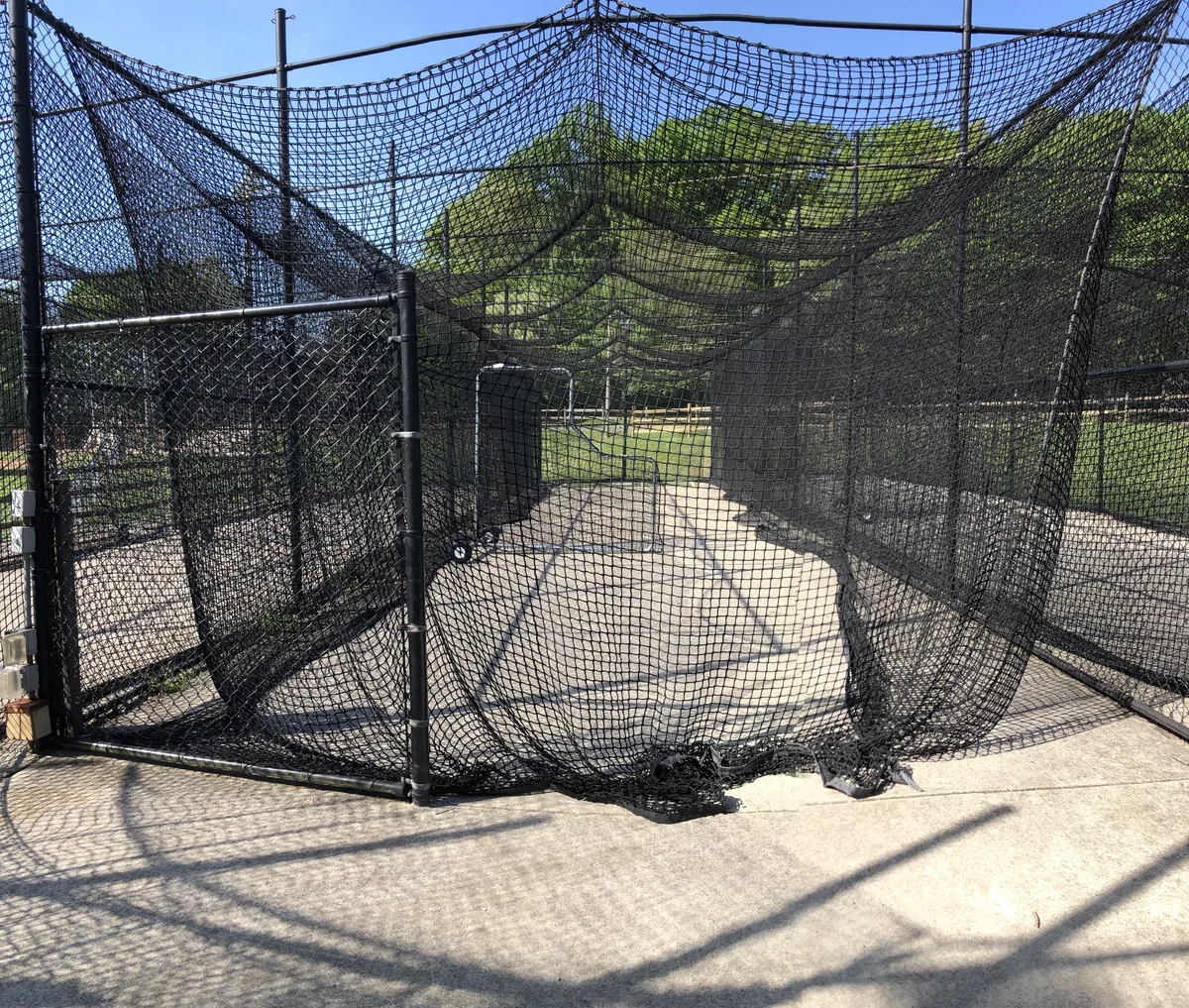 Baseball batting cage at a practice facility for MLB open tryouts 2026